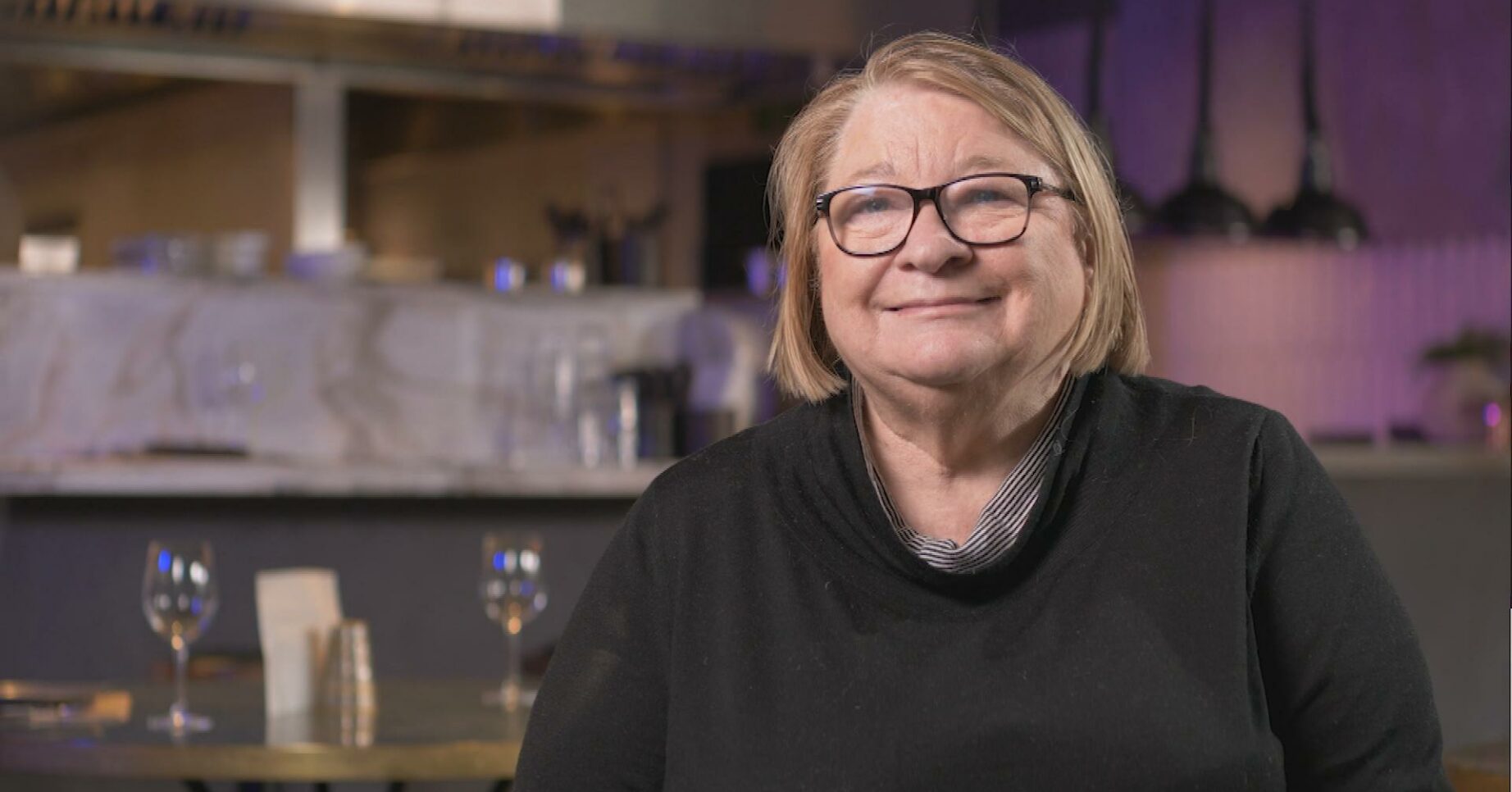 Rosemary Shrager smiling in a TV studio kitchen