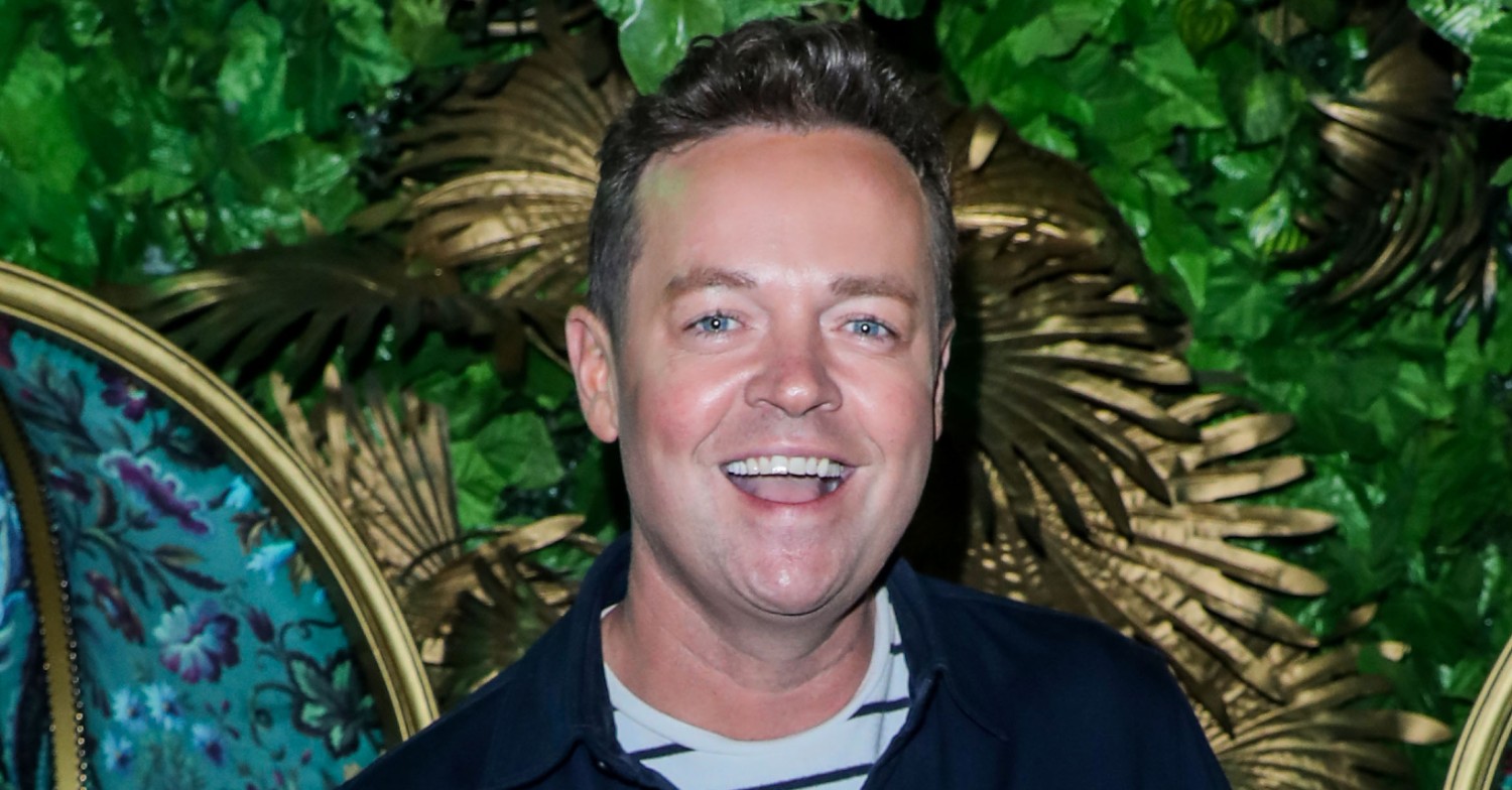 Stephen Mulhern smiling gaily at an extravagant-looking event