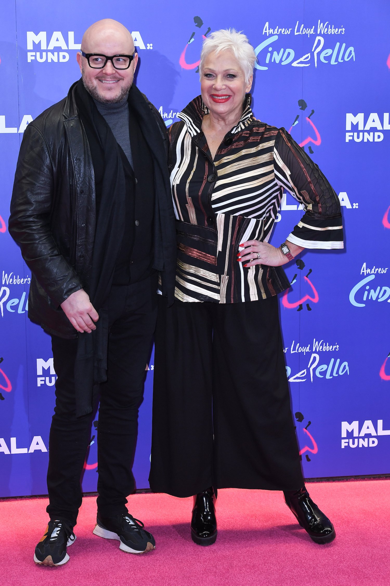 Denise Welch posing happily on the red carpet with husband Lincoln Twonley