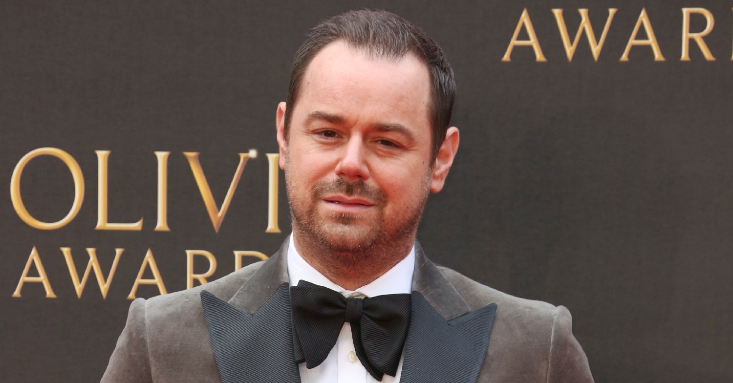 Danny Dyer smiling at an event wearing a smart bow tie and velvet jacket (Credit: Splash)