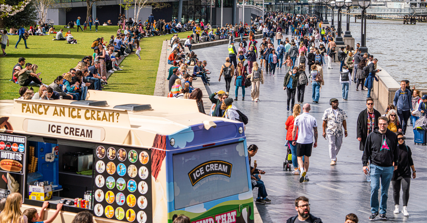 Crowds walk by the river as the sun shines while Brits urged to wear face masks