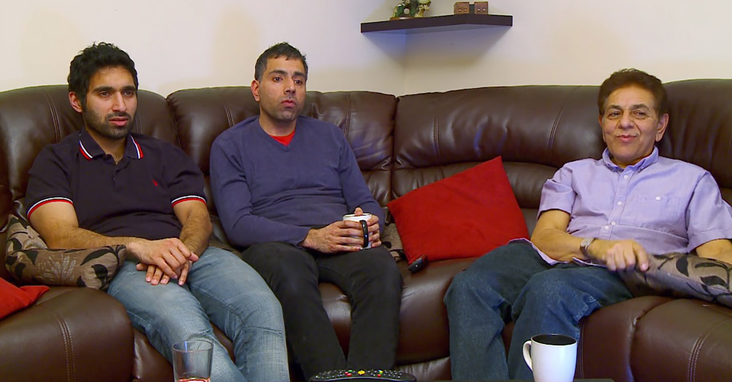 Gogglebox family The Siddiquis watching tv on their leather sofa