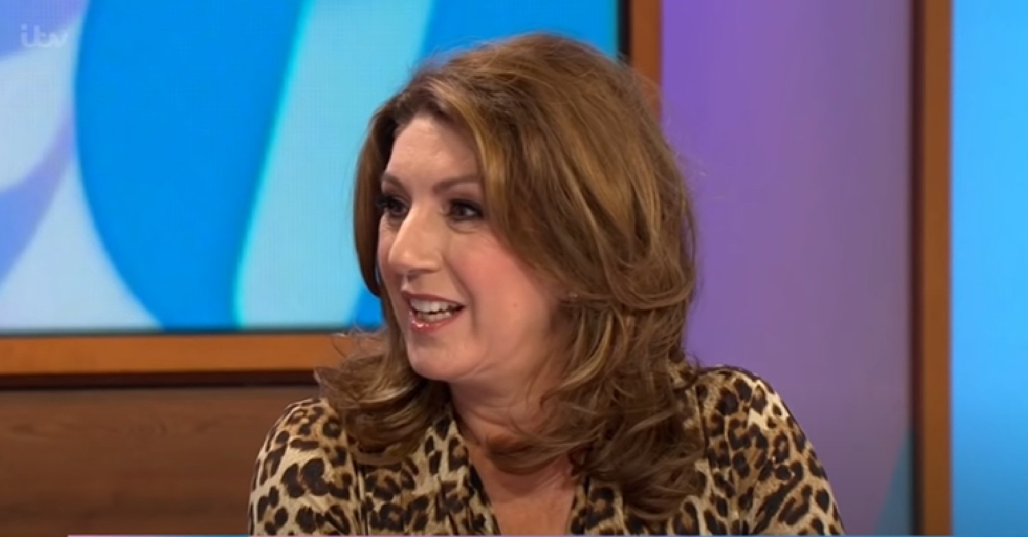 Jane McDonald smiles in animal print top on Loose Women