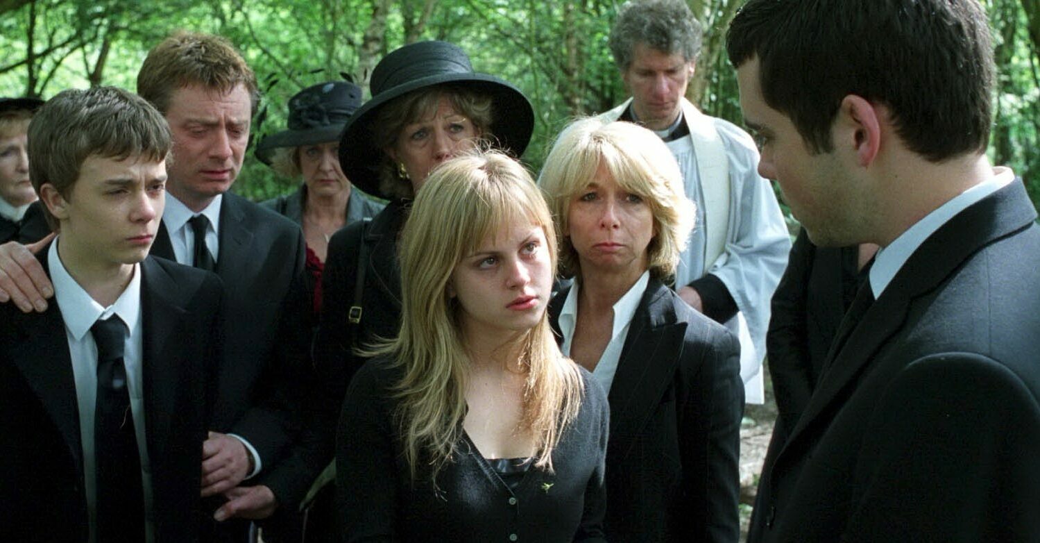 Coronation Street Sarah and Todd at funberal with Gail Audrey David all in balck