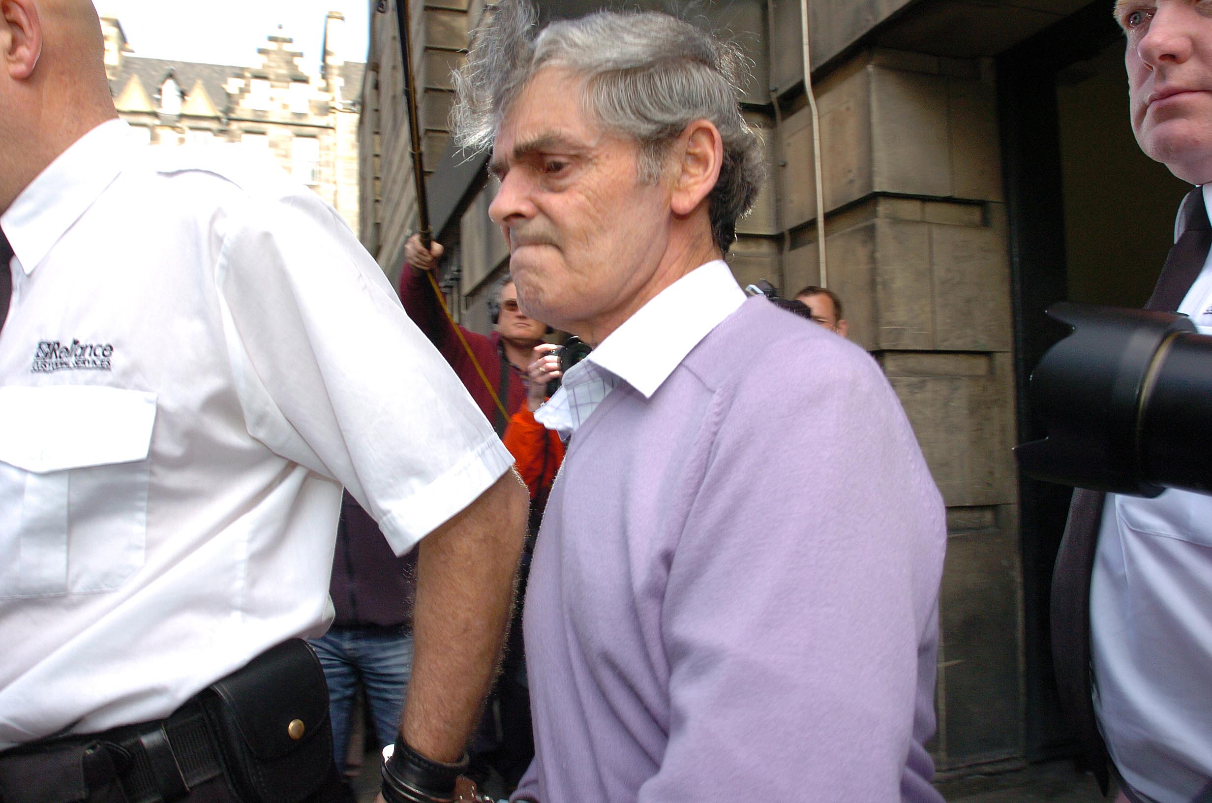 margate killer Peter tobin being led out of court