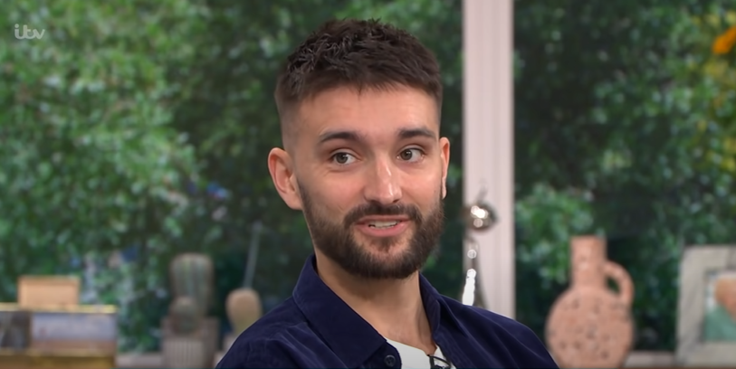 The Wanted singer Tom Parker smiles during interview on This Morning