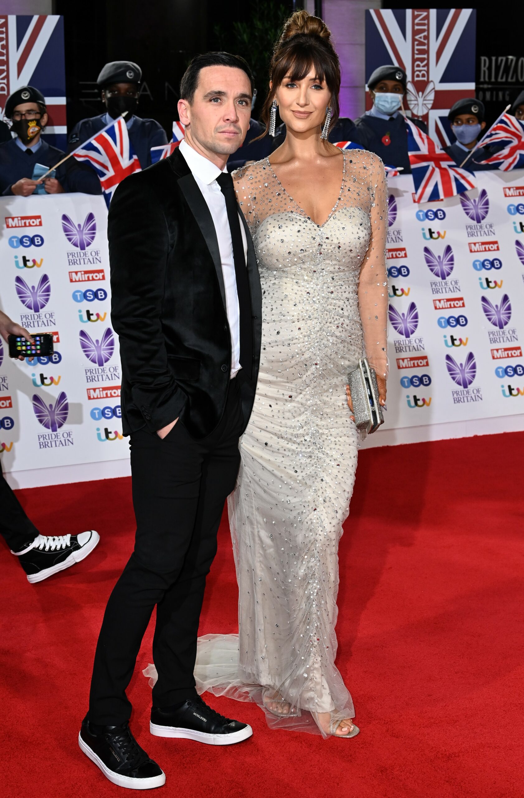 Catherine Tyldesley poses with husband Tom at Pride of Britain Awards