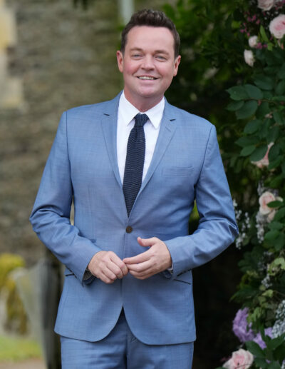 Stephen Mulhern wearing a blue suit smiling