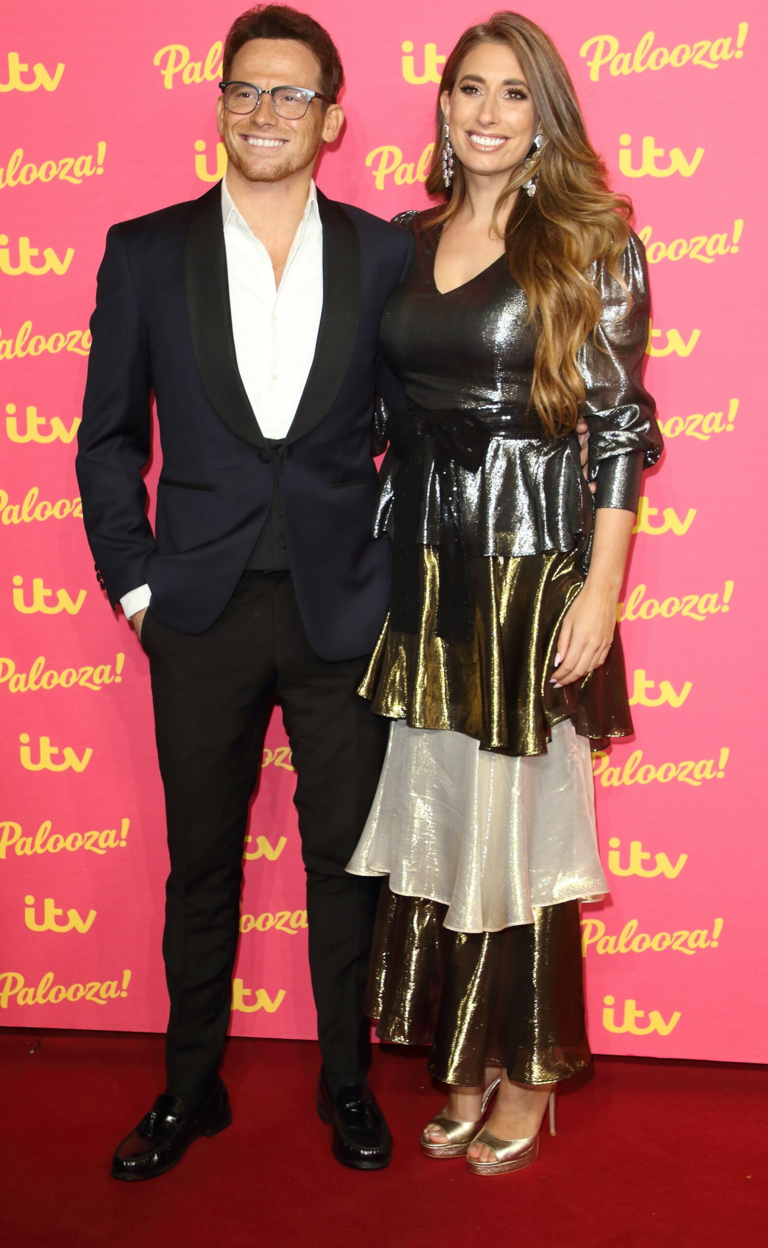 Joe Swash and Stacey Solomon smile at ITV Palooza