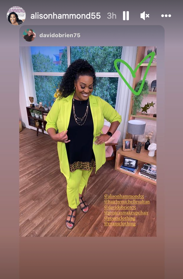 Alison Hammond wearing a bright yellow suit