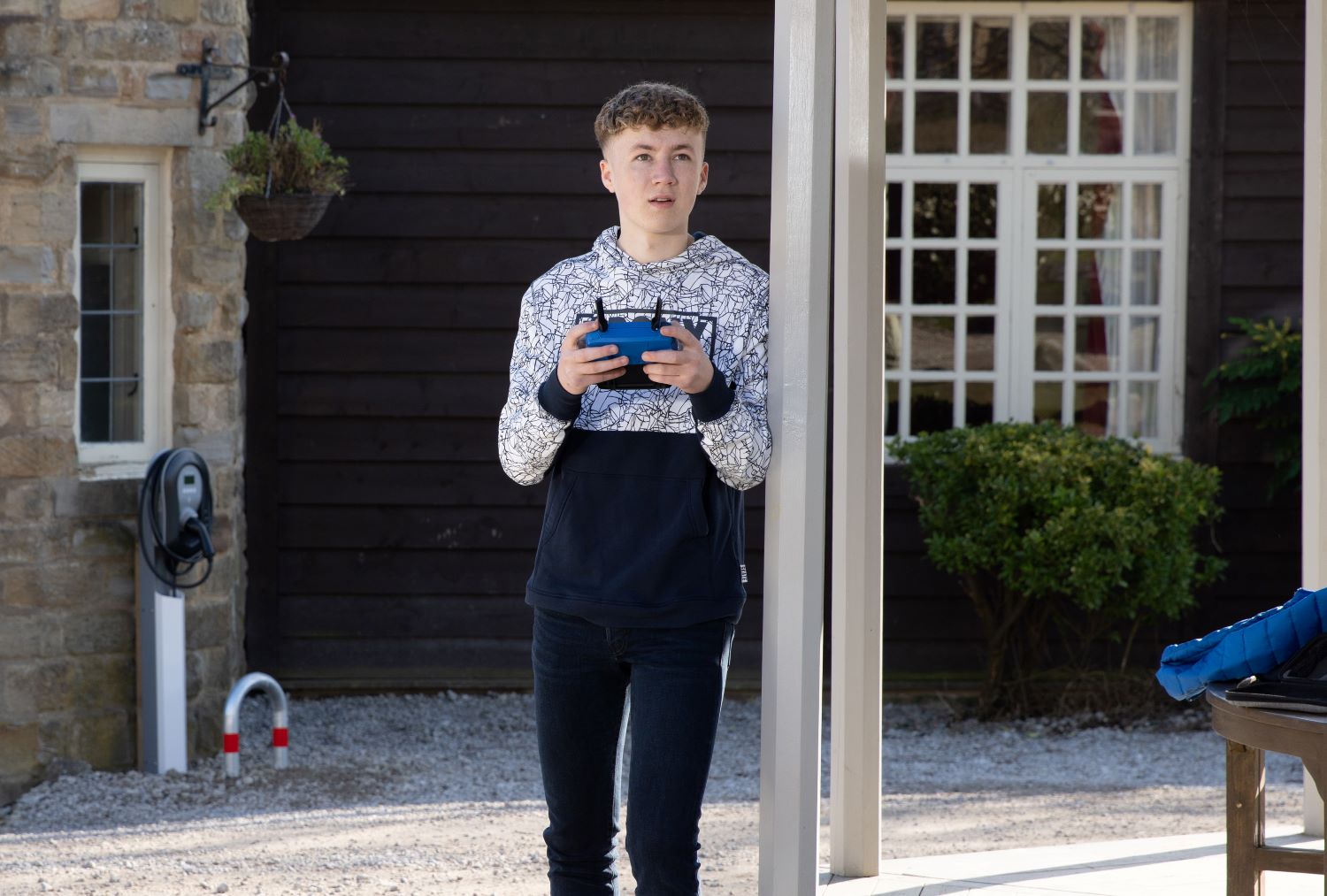 Noah Dingle is pleased as he watches Chloe Harris with his drone