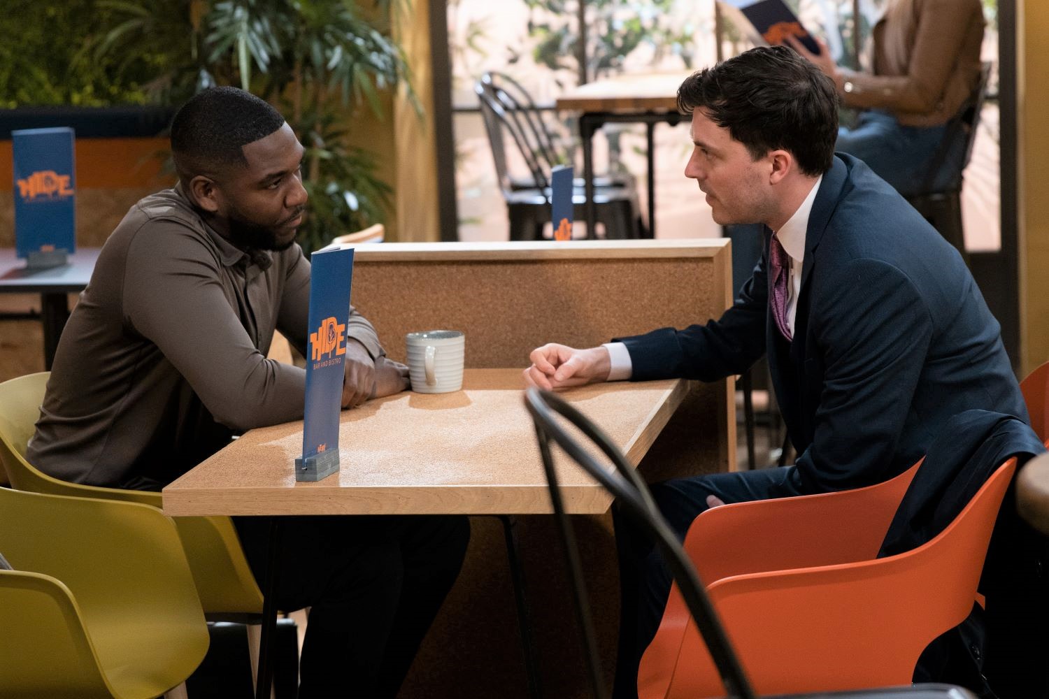 Emmerdale Ethan looks serious as he confides in a colleague