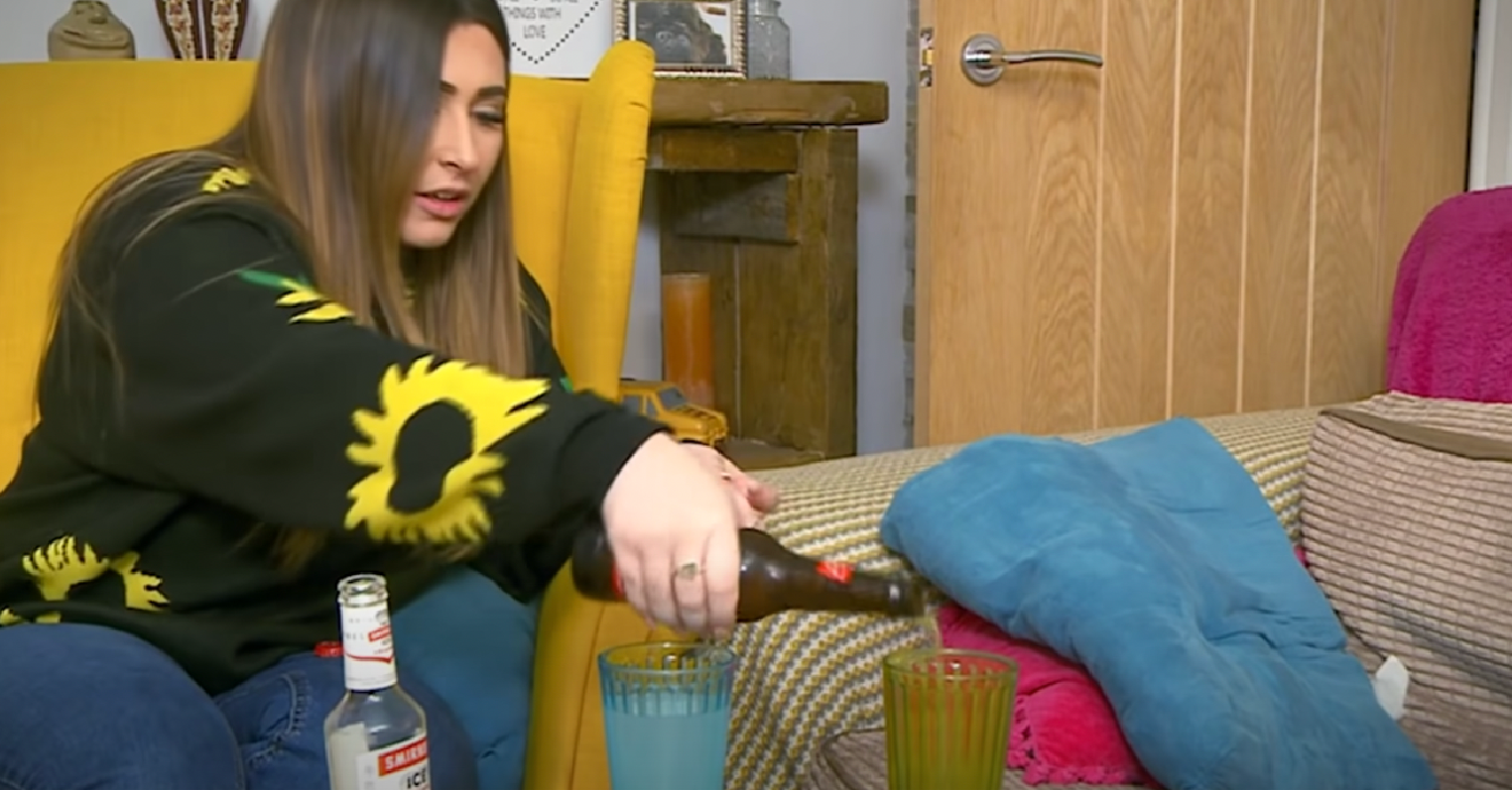 Sophie Sandiford in sunflower jumper pouring drink on Gogglebox