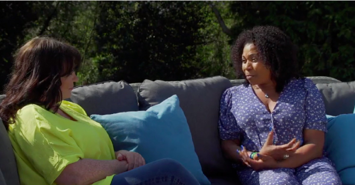 Brenda Edwards and Coleen Nolan chatting outside on a sofa on Loose Women