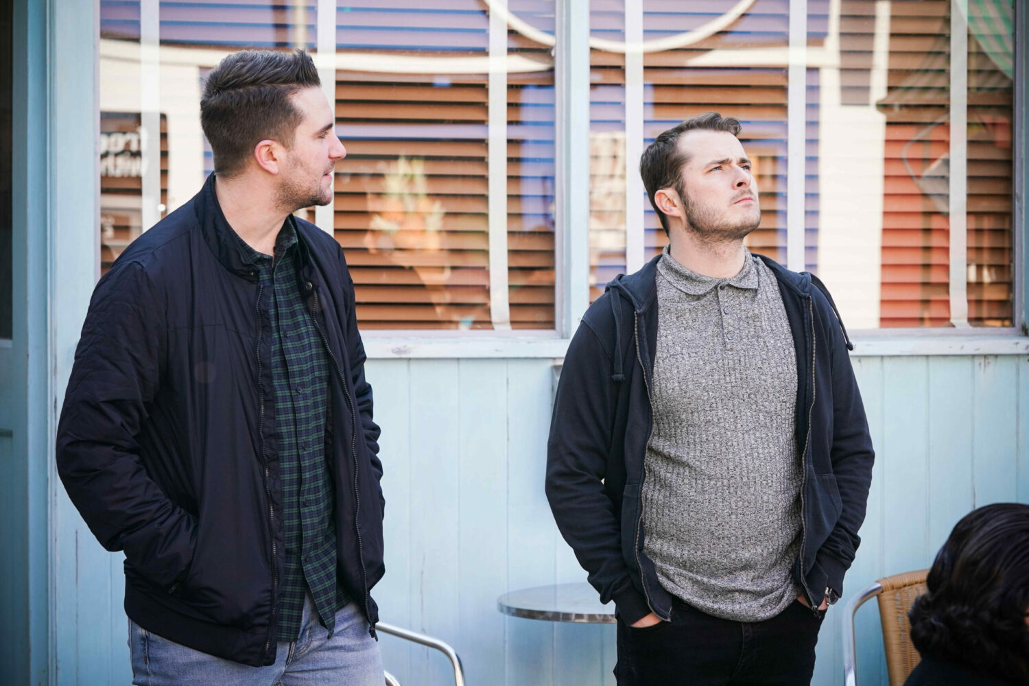 EastEnders Callum watches Ben as he looks unimpressed the police poster