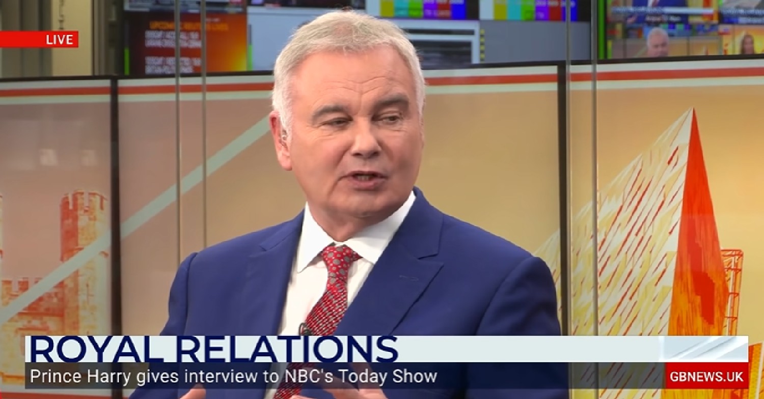 Eamonn Holmes in blue suit while hosting GB News April 2022