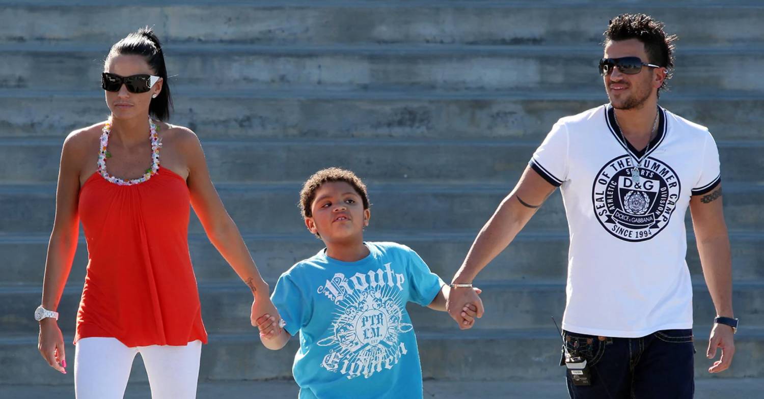 Katie Price and Peter Andre holds hands with Harvey