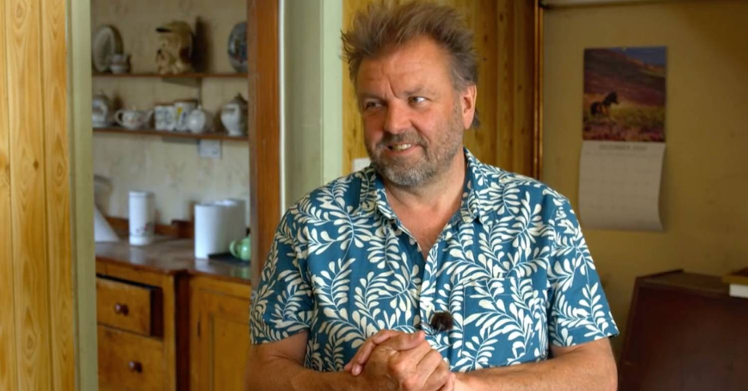 Martin Roberts shows people around another house