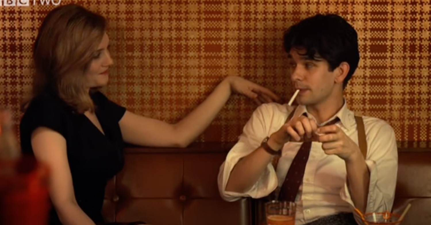 Ben Whishaw in The Hour smoking wearing tie and shirt with a woman
