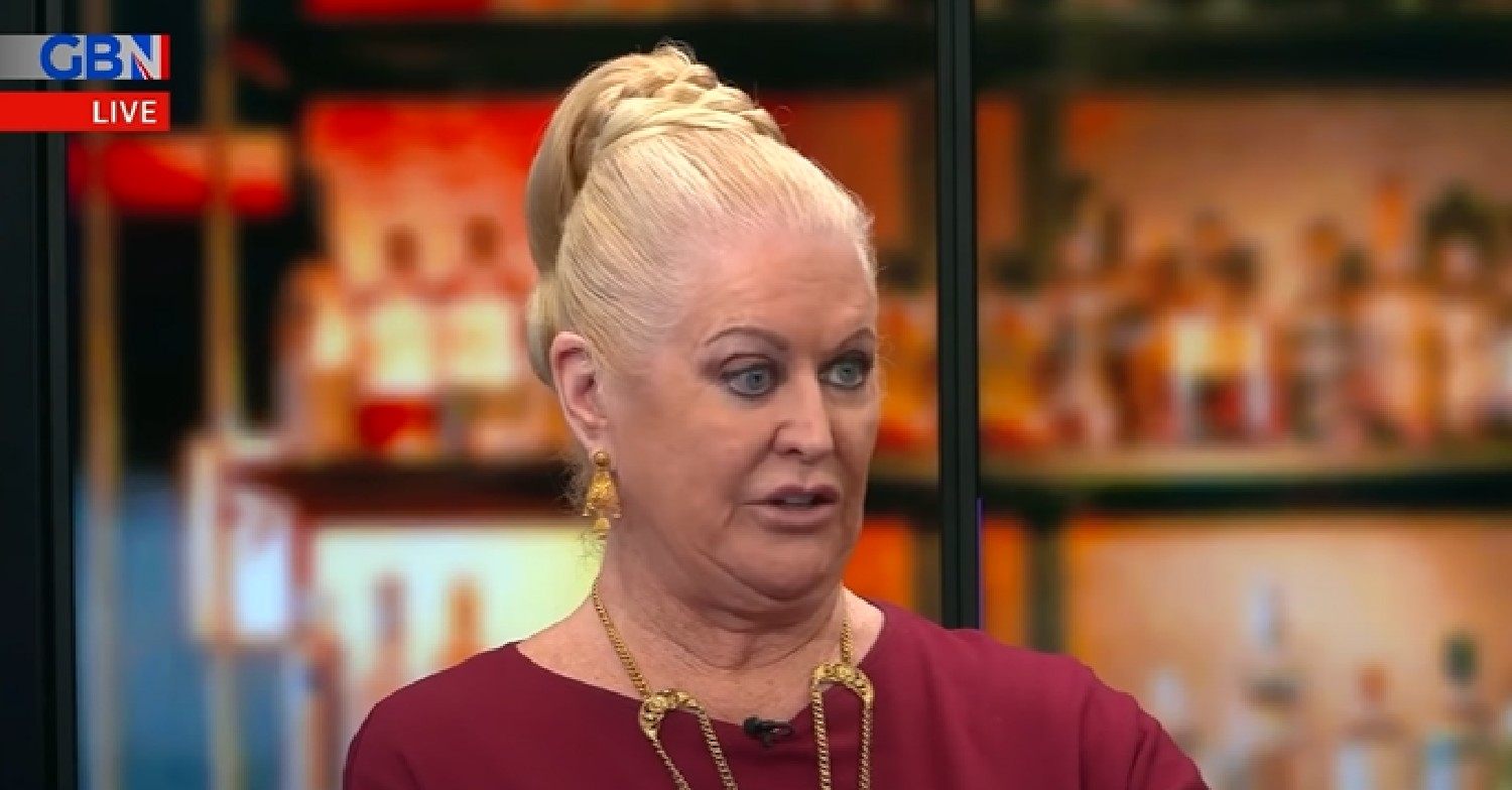 Kim Woodburn speaking in burgundy top on GB News