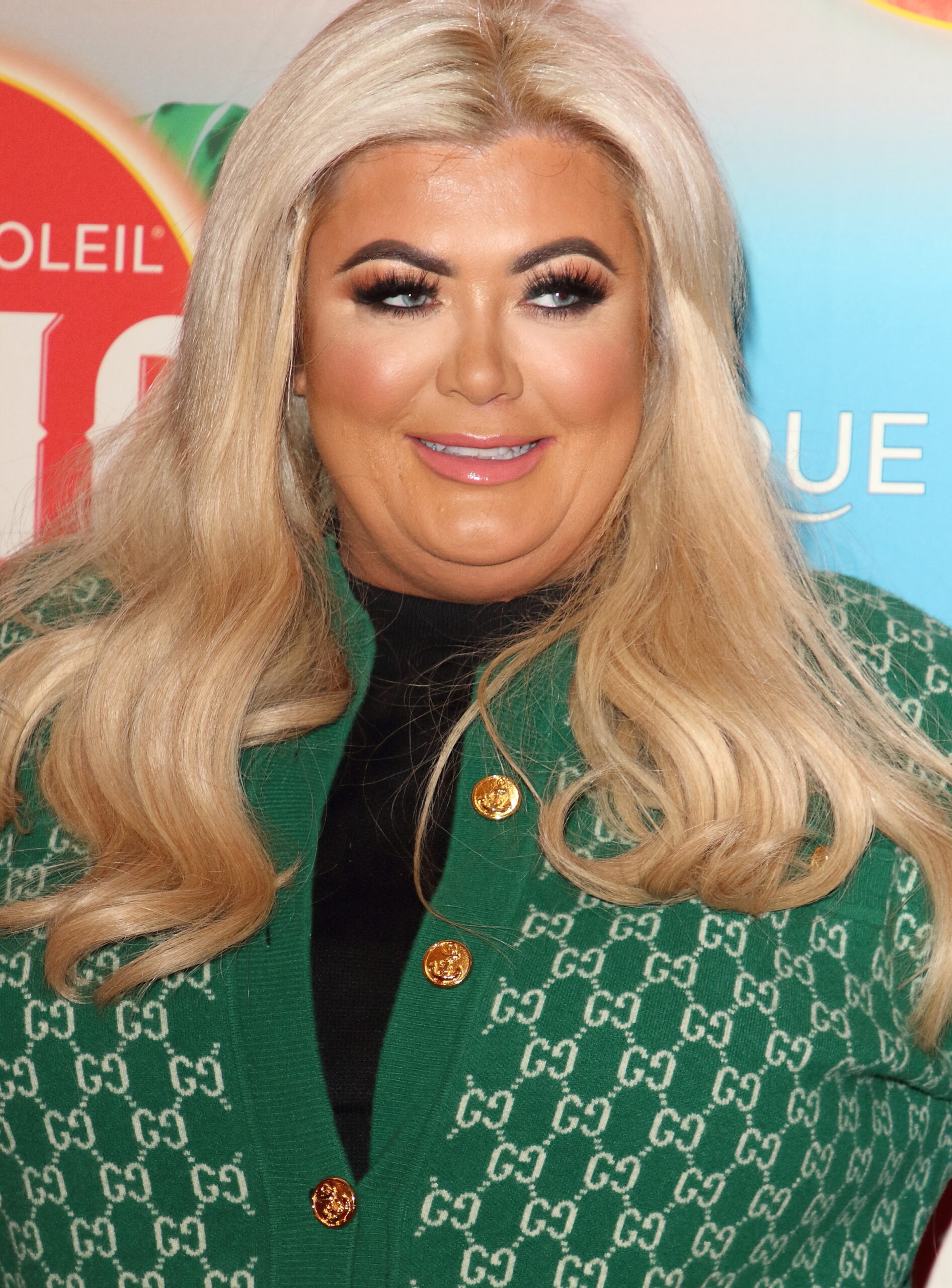 Gemma Collins smiles in green