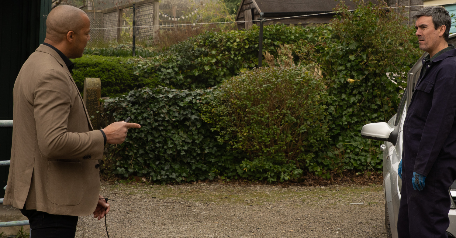 Emmerdale Cain and Al arguing outside by their cars
