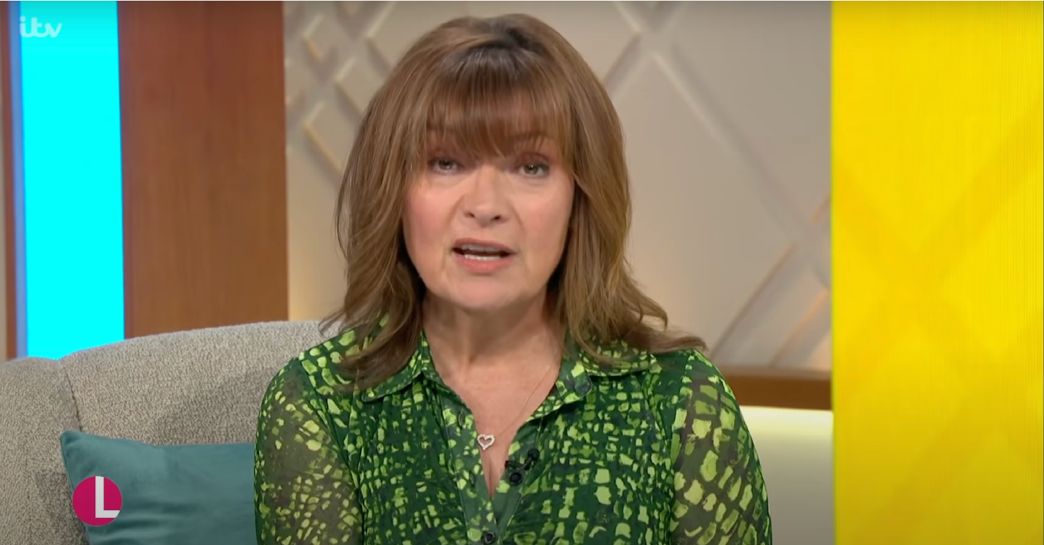 Lorraine Kelly in green patterned blouse on her show