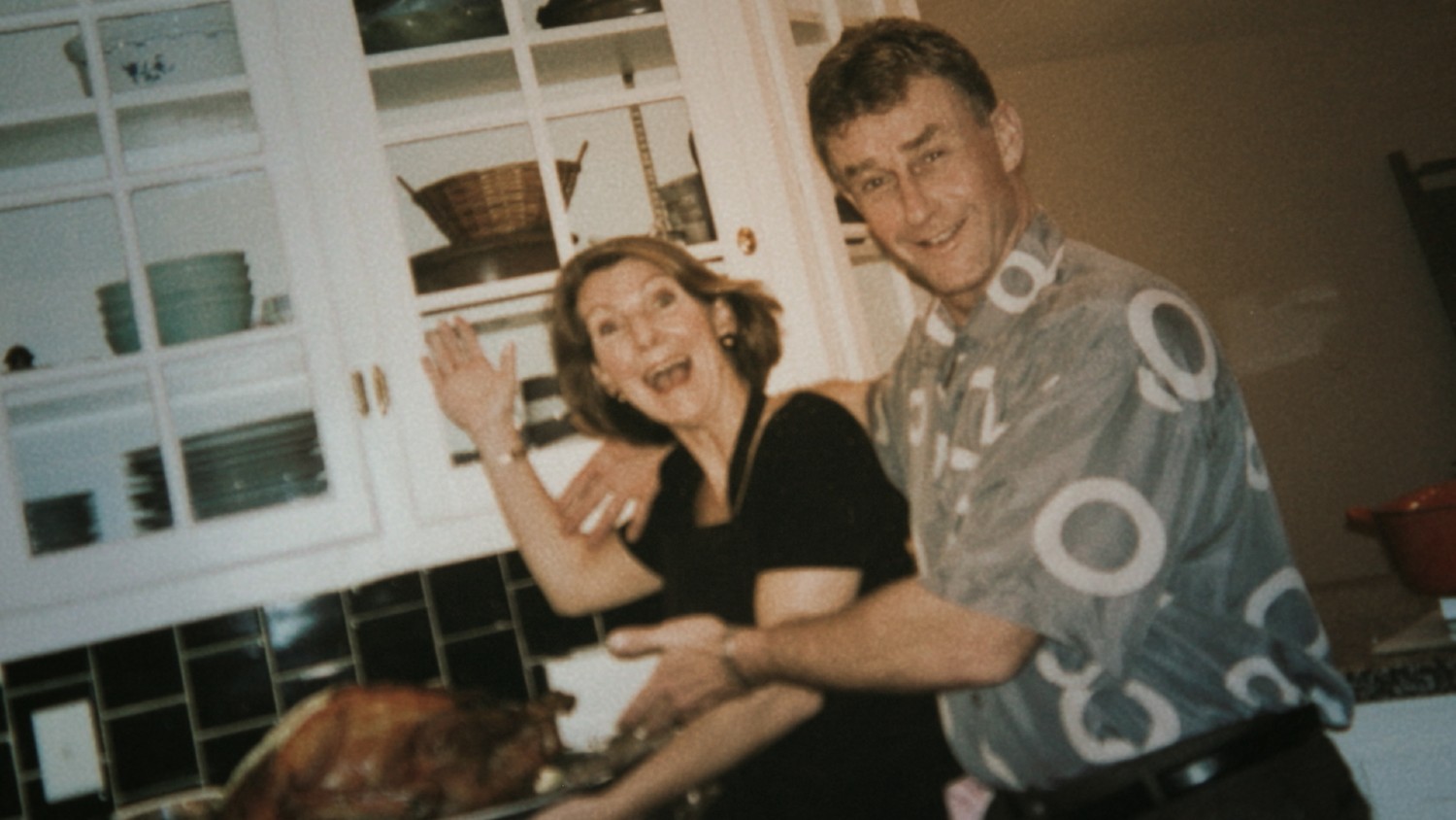 Michael and Kathleen Peterson holding each other