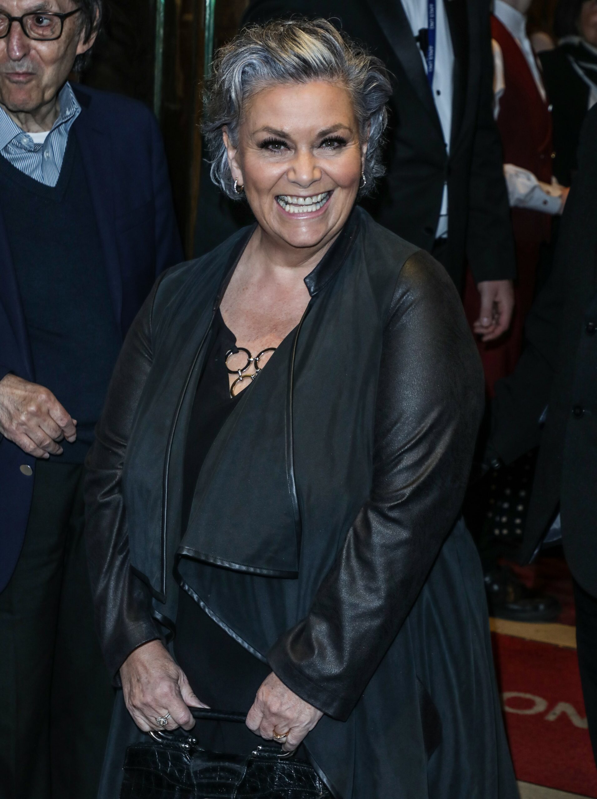 Dawn French smiles in all black outfit and new hair at London event