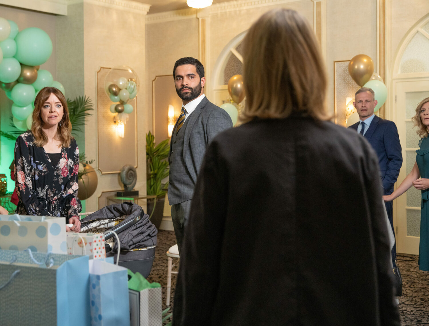Corrie Abi arrives at Alfie's naming ceremony and Imran is stunned
