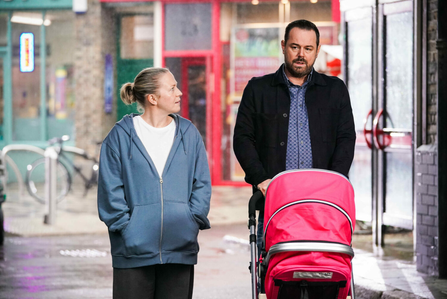 EastEnders Mick and Linda take the baby for a walk