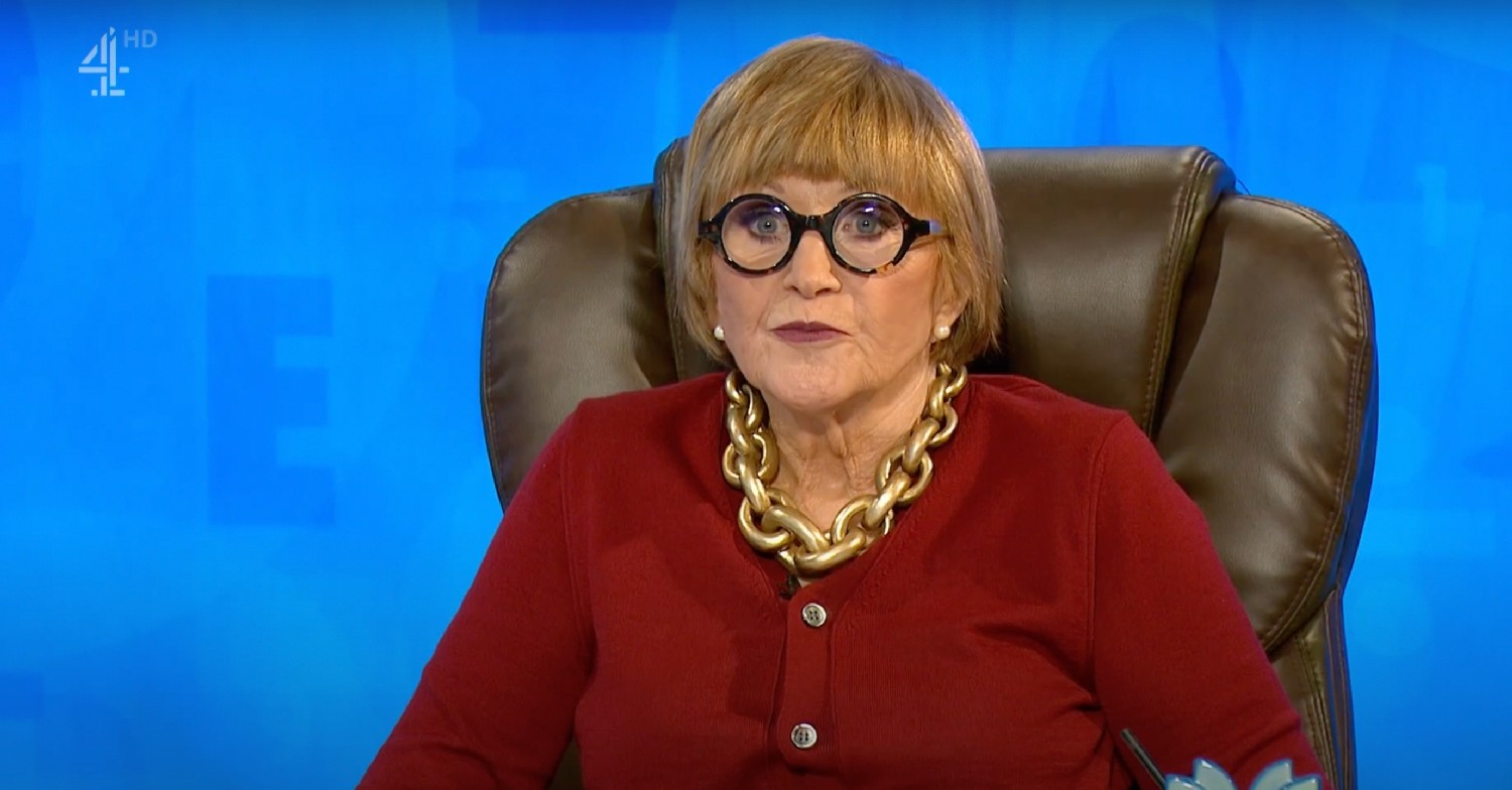 Anne Robinson in red cardigan on Countdown