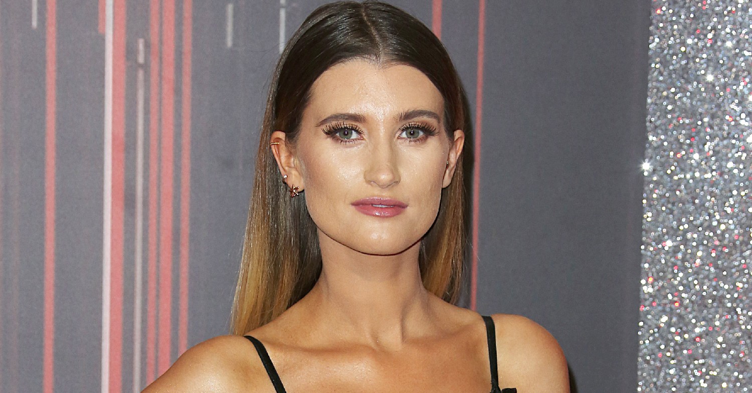 Charley Webb smiles at awards