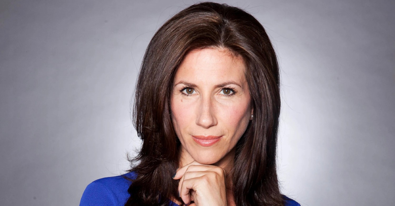 Gaynor Faye looking straight at the camera with her hair down