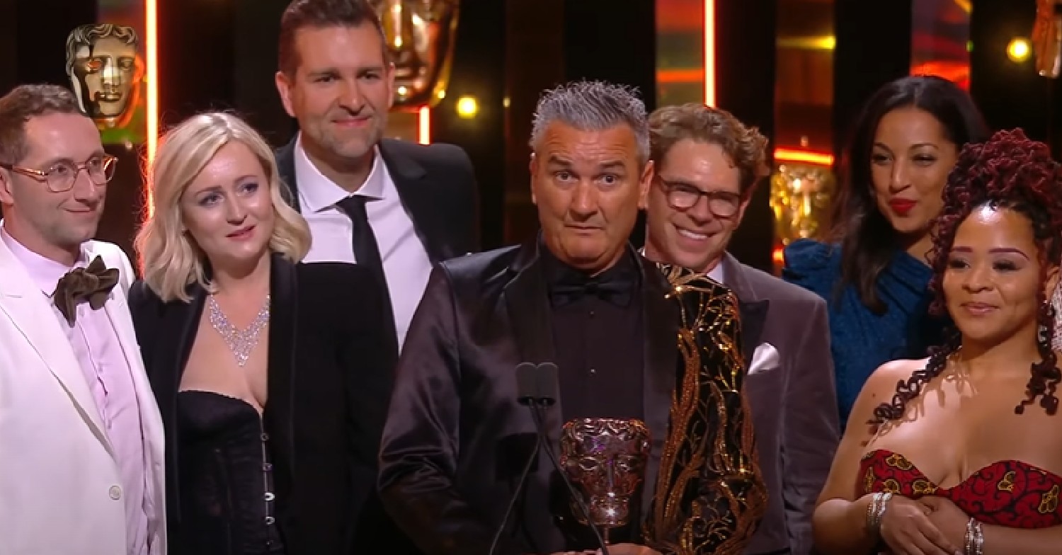 Gogglebox stars, including Lee Riley, on stage at BAFTAs after winning award