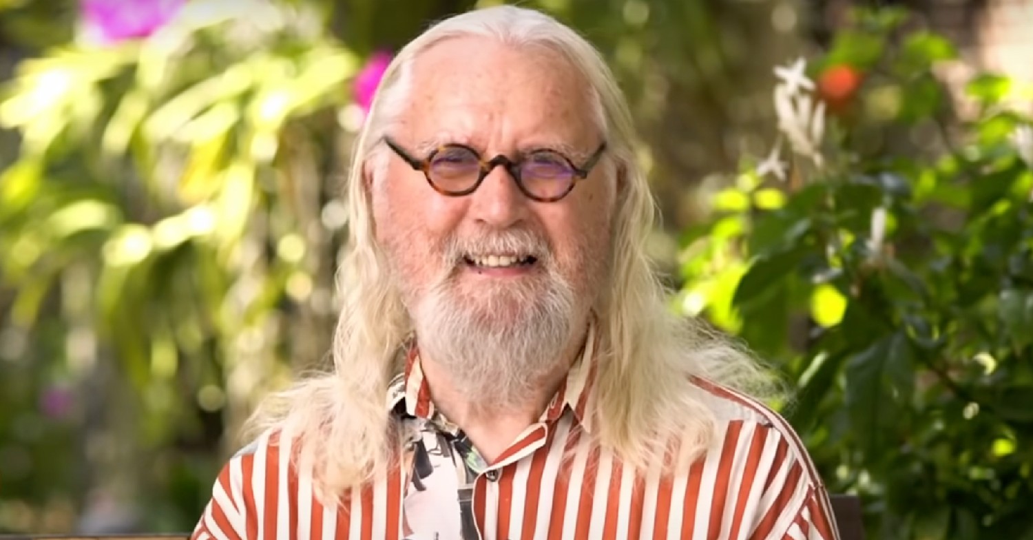 Billy Connolly speaking to camera as he wins BAFTA