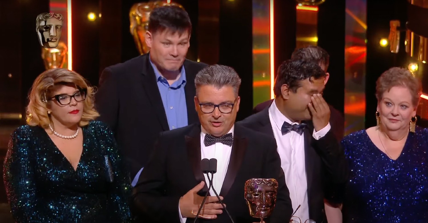 Paul Sinha crying the Chase Bafta
