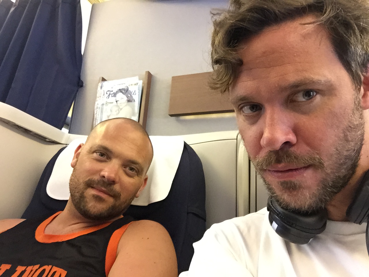 Will Young and his twin brother Rupert on a plane