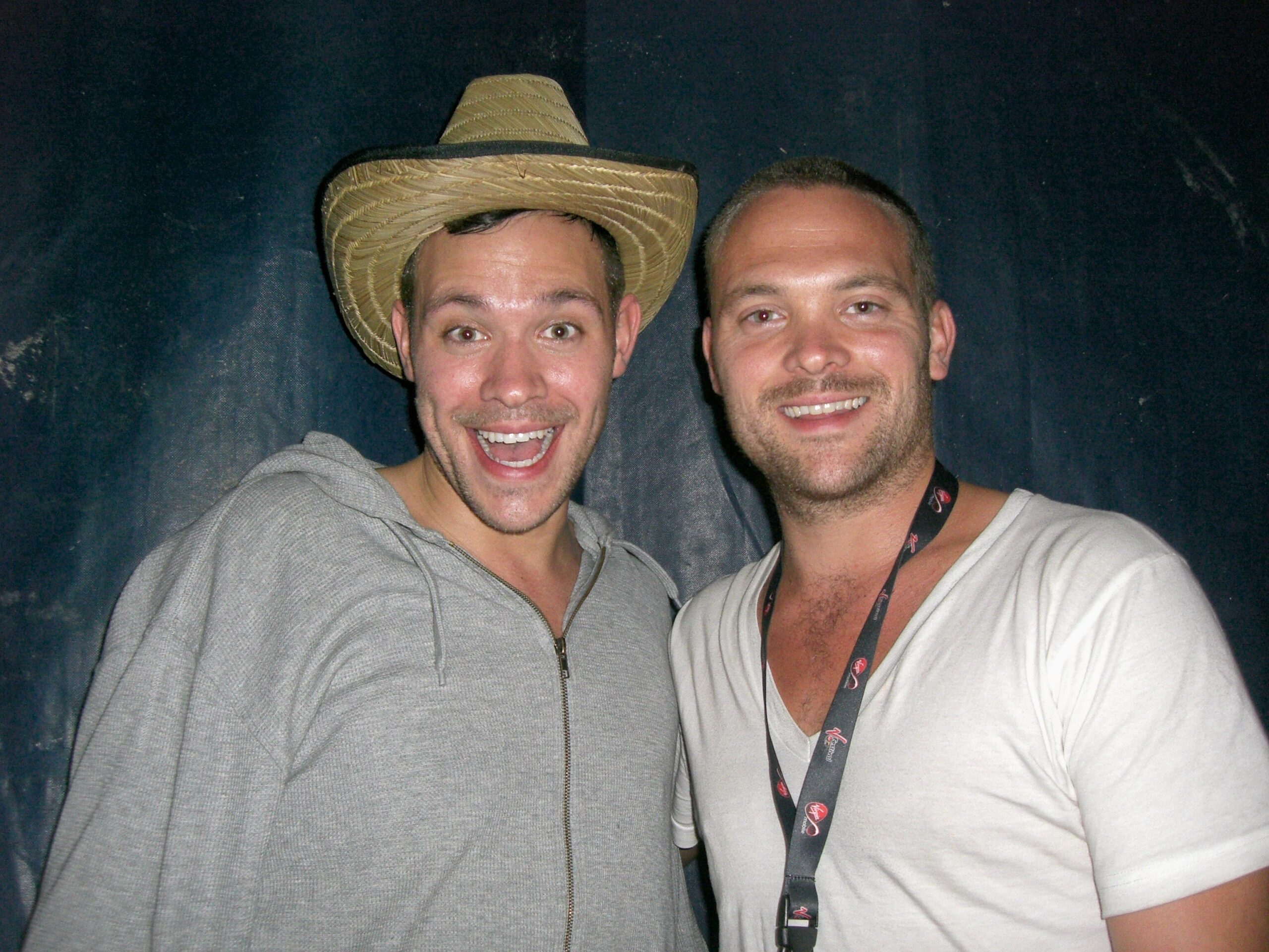 Will Young smiling with his twin brother Rupert