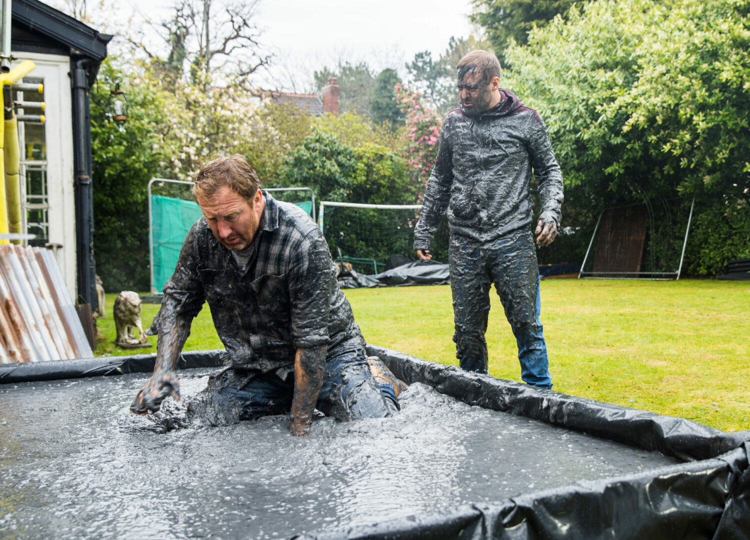 Coronation Street Phill and Tyrone fall into the wet cement after their fight and Phill searches for an engagement ring