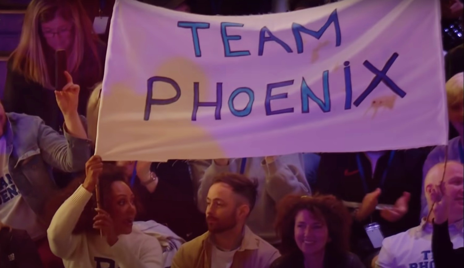 Mel B holding up a flag on The Games