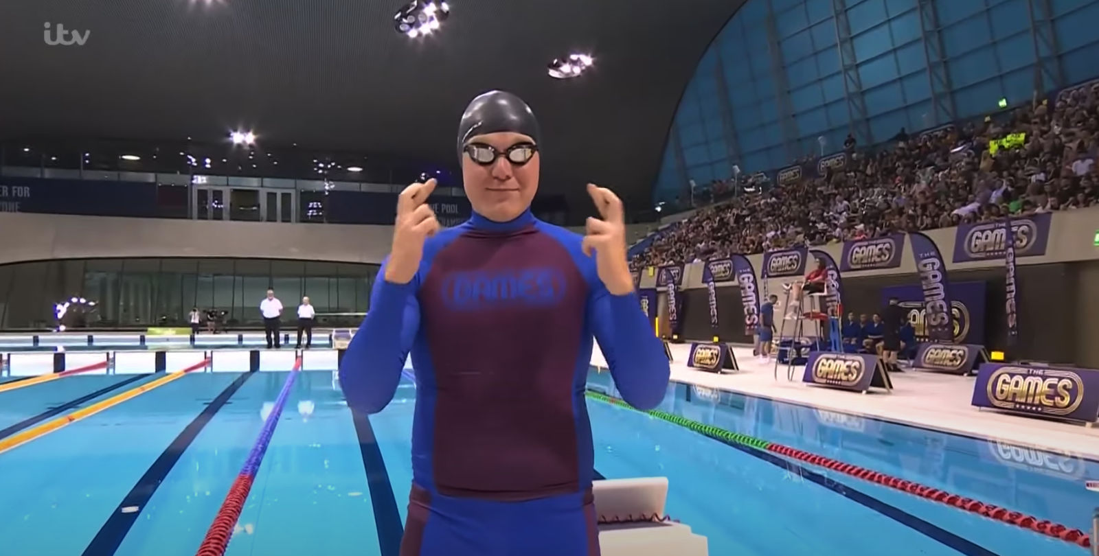 Colson smith beside the swimming pool on The Games