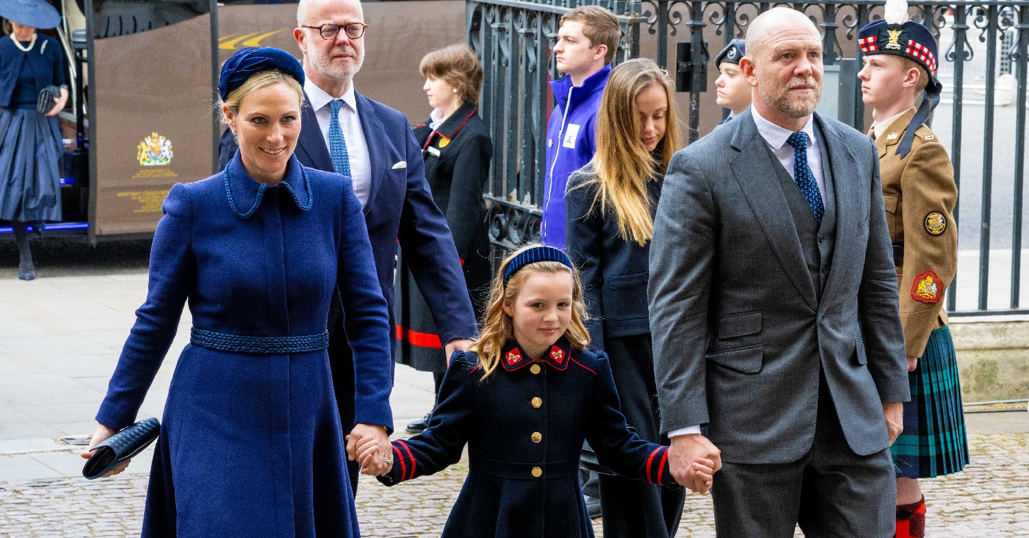 Zara Tindall and Mike Tindall holding hands with their daughter, Mia Tindall