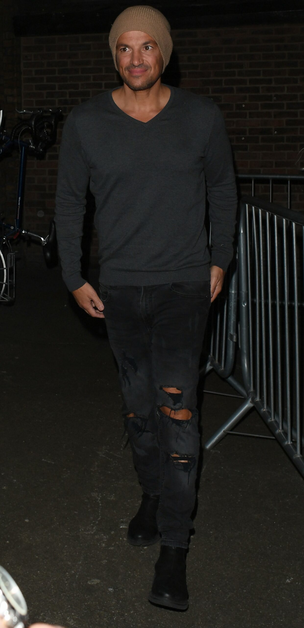 Peter Andre in beanie hat as he leaves Grease the play