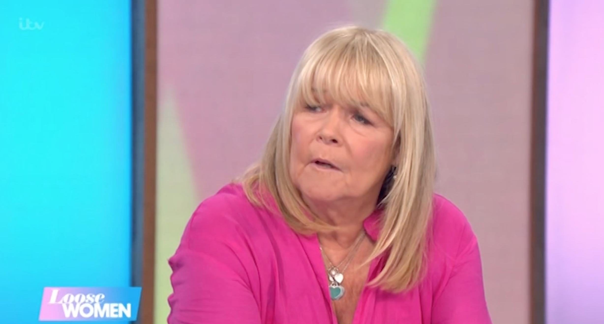 Linda Robsonon Loose Women scowling in pink