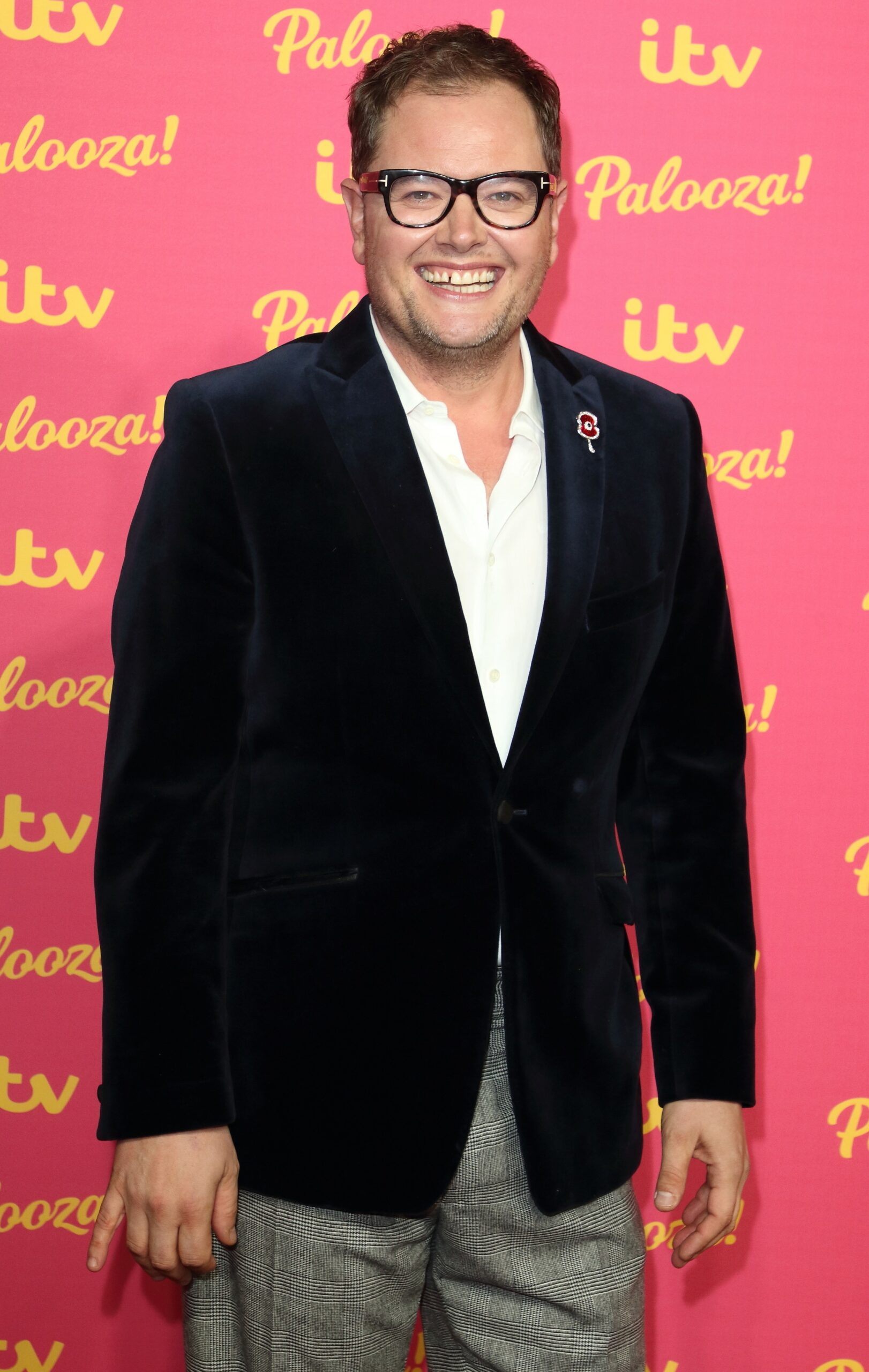 Alan Carr smiles at ITV Palooza