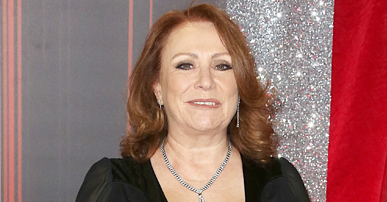 Coronation Street star Melanie Hill posing in a black dress at the soap awards