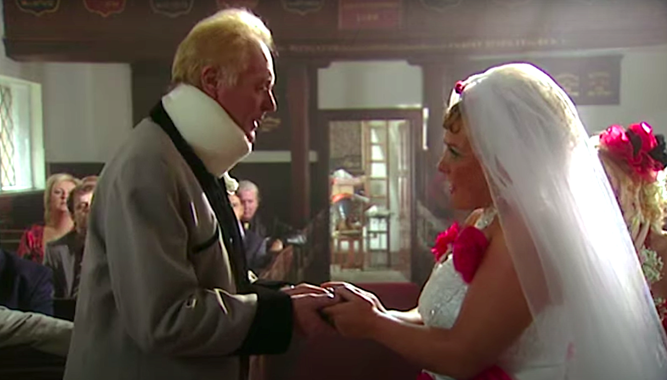 Les and Cilla Battersby Brown get married with Les in a neck brace