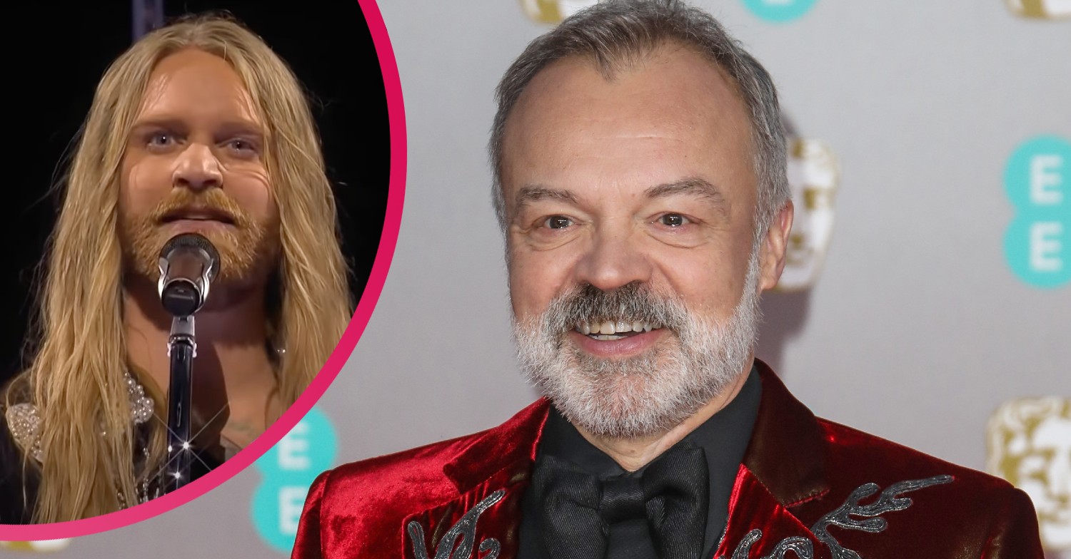 Graham Norton smiling alongside Eurovision 2022 star Sam Ryder