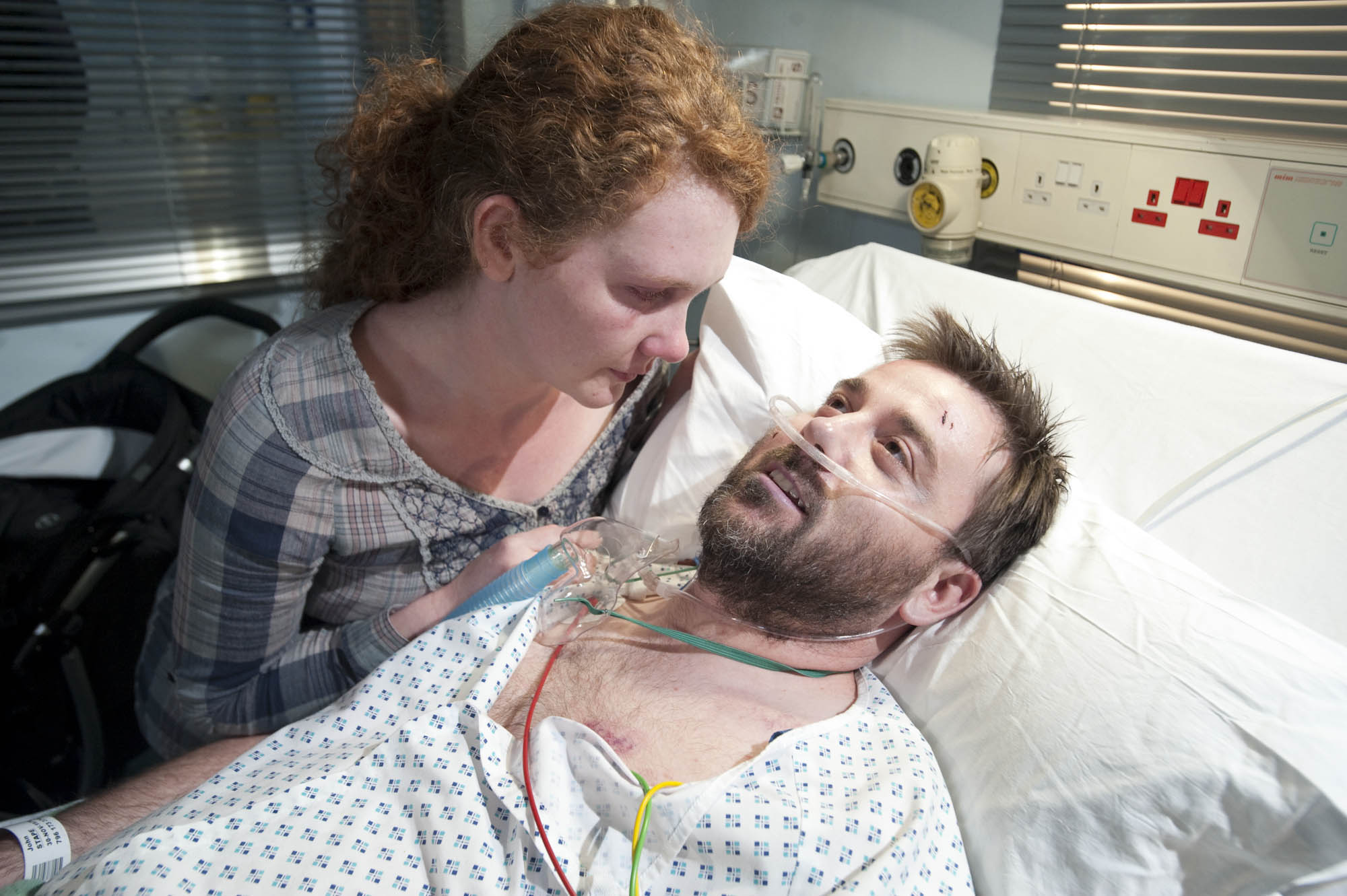 Fiz and John in a hospital bed in Corrie 